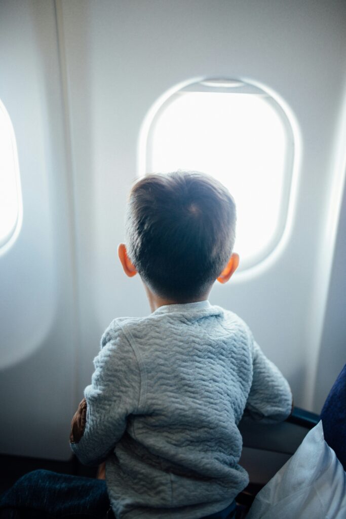 child traveling on an aeroplane