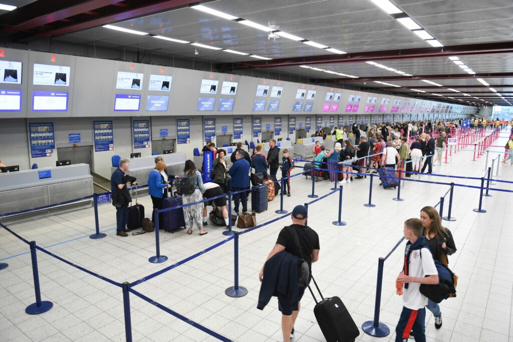 People at airport checkin