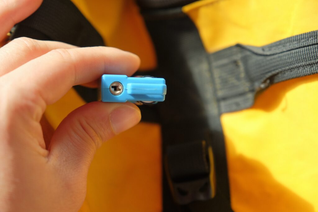 Travel Sentry | Should You Receive a Key with a TSA Lock? TSA lock showing underside tool hole for TSA agents